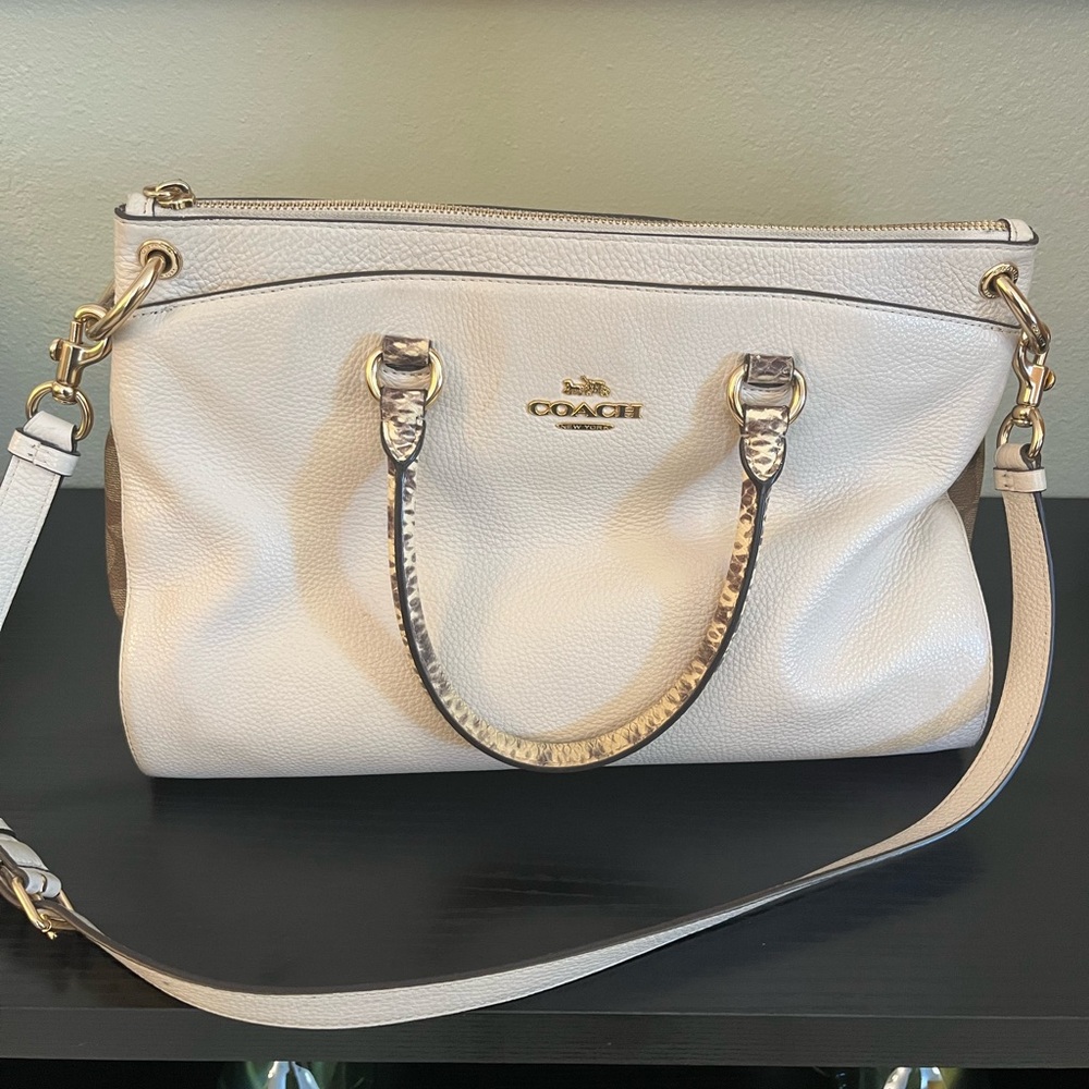Coach Cream Leather Satchel Bag with Gold Accents and Snake print.